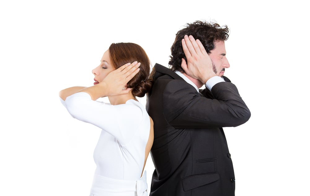 Closeup portrait of man woman couple standing with backs together covering ears, closed eyes, not listening to each other isolated on white background. Negative human emotions facial expressions-1