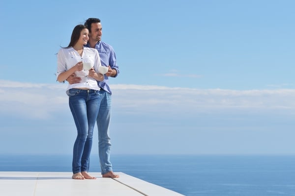 happy young romantic couple have fun relax smile at modern home indoor and outdoor